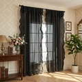 Sheer black voile curtains with elegant ruffled edges for a vintage aesthetic - Black