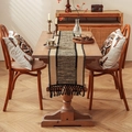 Beige and black striped woven table runner with tassels in a cozy home setting - 30x50cm / Black and Khaki
