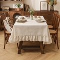 Cream linen tablecloth with elegant ruffled edges on a rustic wooden dining table - 140*100cm / Off White