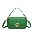 Bolso vintage verde esmeralda de cuero con elegante cierre metálico dorado - Verde