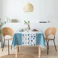 Tovaglia nordica in PVC azzurro con motivi geometrici e frange con nappe bianche - 140*180cm / Blu