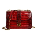 Red crocodile pattern chain crossbody bag with golden bow clasp for women - Red