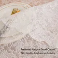 White French lace rectangular tablecloth with floral embroidery and wavy edges on a dining table - 135*135cm / White