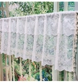 Close-up of white floral lace curtain with fringe tassels and semi-transparent texture - White American Style Curtain