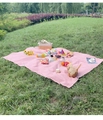 Detail of pink and white checkered picnic mat with waterproof fabric on green grass - 150*240cm / Pink