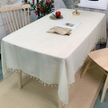 Cream rectangular linen tablecloth with elegant fringe tassels in a Nordic style setting - 100*140cm / Beige