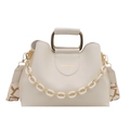 Minimalist cream white PU leather tote bag with golden metal handle and printed strap - White