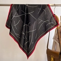 Detail of a black square scarf with white abstract lines and red-gold borders - 68*68cm / Black