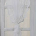 Elegant white lace curtain with floral embroidery and scalloped edges tied back - 140x100 / White