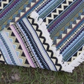 Bohemian geometric picnic blanket with colorful zigzag pattern and white tassels on grass - 100x150 / Aqua
