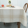 Tovaglia nordica a quadri beige e bianchi in lino su un tavolo di legno in camera luminosa - 100x140cm / Cachi