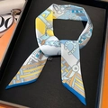 Elegant silk twilly scarf with blue and yellow chain print on black display tray - 5*85cm / Blue Edge