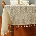 Elegant beige crochet lace tablecloth with fringe trim on a wooden dining table - 140*240CM / Wave Beige