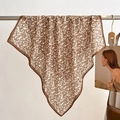 Detail of a large floral silk scarf with vintage brown flower patterns and hemmed edges - Brown