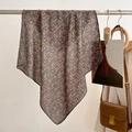 Detail of floral silk scarf hanging on rack showing the smooth texture and drape - 68*68cm / Dark Gray