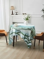 Round tablecloth with green impressionist landscape painting in a modern dining room - Light Green
