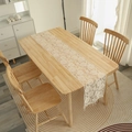 Vintage beige floral lace table runner with intricate embroidery on wooden table - Branch Floral (Cream)