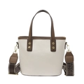 Bolso tipo cubo blanco crema con ribete de cuero marrón y correa ancha de tejido - Blanco