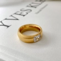 Macro view of gold-plated titanium steel ring featuring a square-cut clear zircon stone - US 6 / Bright Gold