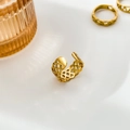 Detailed close-up of a gold hollow geometric lattice ring with an open-back design - Lace Pattern Open Style