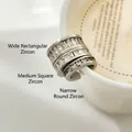 Macro shot of three titanium steel rings with rectangular, square and round cubic zirconia - Wide Rectangular Zircon Steel Color (Diameter 1.5cm)