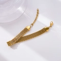 Detail of wide flat gold braided chain bracelet with lobster clasp and extension links - Wide Mesh Watch Band Style
