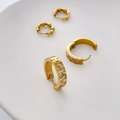 Detailed view of gold geometric hoop earrings with square zircon checkered pattern inlay - Zirconia Checkerboard Style / Gold