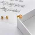 Detail of minimalist gold-plated oval bean earrings on a jewelry display box - Gold Glossy Small Oval Style