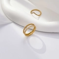 Macro detail of dual-layer twisted chain ring and V-shaped 18K gold plated zircon band - US 6 / Double Layer Twist Half Diamond