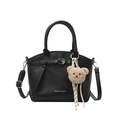 Black litchi grain tote bag with shoulder strap and plush bear charm accent - Black