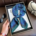 Navy and green paisley satin neck scarf tied in a knot on a black display tray - 70*70cm / Blue (W-289)