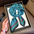 Blue and red paisley pattern faux silk skinny scarf displayed in a wooden tray - 70*70cm / Blue (W-296)