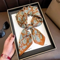 Brown paisley silk scarf tied elegantly with fashion accessories on a white tray - 70*70cm / Orange (W-299)