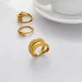 Detailed view of three 18K gold plated titanium rings with abstract curved knot designs - US 6 / Thick Curved Double Layer
