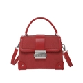 Red crossbody bag with textured faux-snake skin finish and silver metal lock closure - Red
