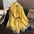 Elegant bright yellow silk-like scarf with wide silver-grey shiny trim for women - Yellow