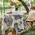 Detail of round French pastoral tablecloth with blue botanical print and ivory fringe - 150x100 / Blue Floral Print
