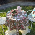 Round pastoral tablecloth featuring pink berries and white floral patterns in khaki - Amber Brown Plum Blossom