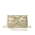 Golden metallic ballet style crossbody bag featuring a large bow and chain strap - Gold