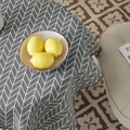 Close-up of grey herringbone cotton linen tablecloth with decorative tassel edge details - 60*60cm / Grey Arrow