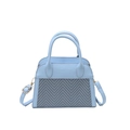 Light blue faux leather crossbody bag with fabric panel and gold-toned hardware - Blue