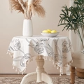 White round linen tablecloth with black tulip prints and decorative white tassels - White Tulip
