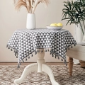 Round linen tablecloth with grey geometric triangle pattern and decorative tassels - Small Black Triangle
