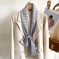Elegant light blue long silk scarf with golden chain pattern worn on a white suit jacket - 12*148cm / Sky Blue