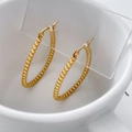 Detailed close-up of 18K gold-plated stainless steel hoop earrings with beaded texture - Small Bead Style