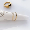Detailed set of three gold-plated rings featuring a black heart-shaped zircon stone - US 6 / 4 Small Black Diamonds