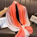 Detail of gradient satin scarf in orange and white with a luxurious glossy finish - 90*180cm / Orange-Red Gradient
