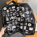 Detailed pattern of silk scarf showing monochrome prints of heels and handbags - 65*65cm / Black