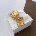 Detailed view of gold plated rectangular stud earrings with a vertical ripple texture - Horizontal Ribbed Style