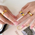 Vintage 18K vergulde titanium ringenset met gekleurde zirkoonstenen aan de hand - US 6 / Boog Donkerblauwe Zirkonia